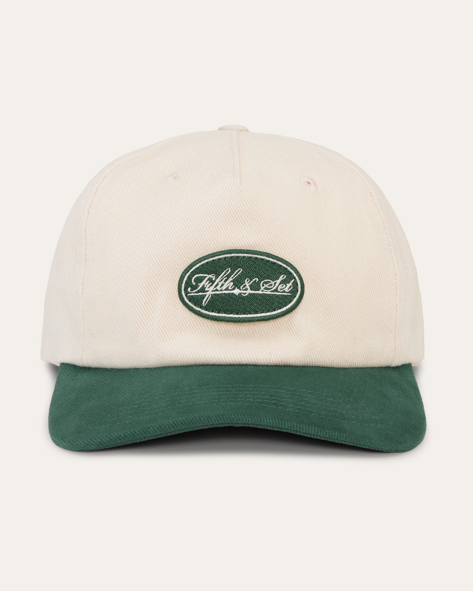 baseball hat in cream and green