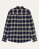 A long-sleeve plaid button-up shirt shown flat against a light off-white background. The shirt features a dark navy blue base with a cream and white plaid pattern.