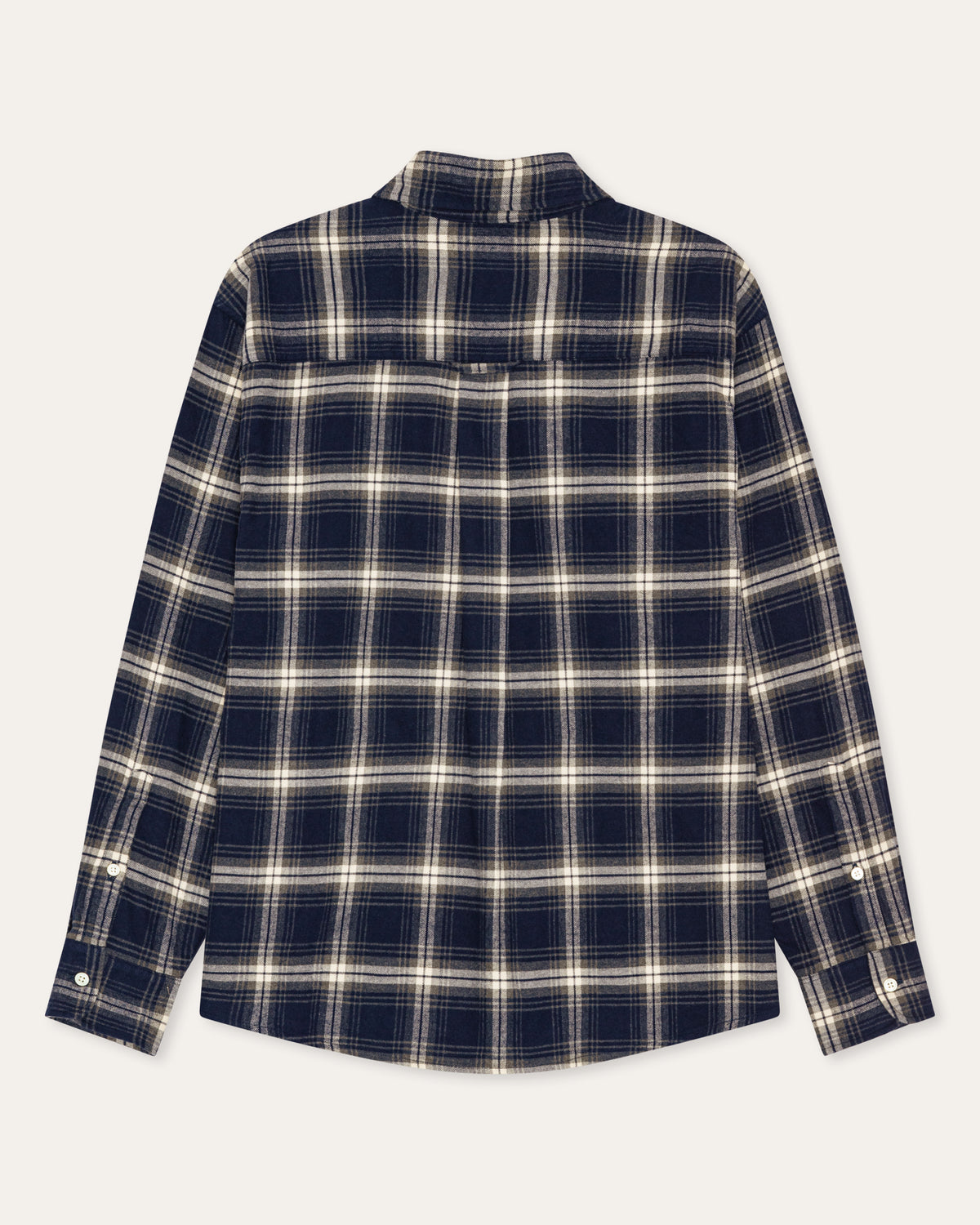 A long-sleeve plaid button-up shirt shown flat against a light off-white background. The shirt features a dark navy blue base with a cream and white plaid pattern.
