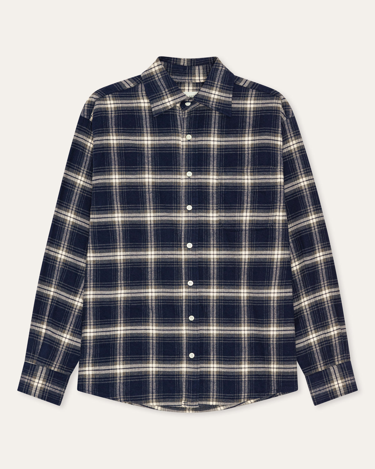 A long-sleeve button-up plaid shirt in navy blue and cream, laid flat against a light off-white background.