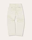 White chino trousers on a white background