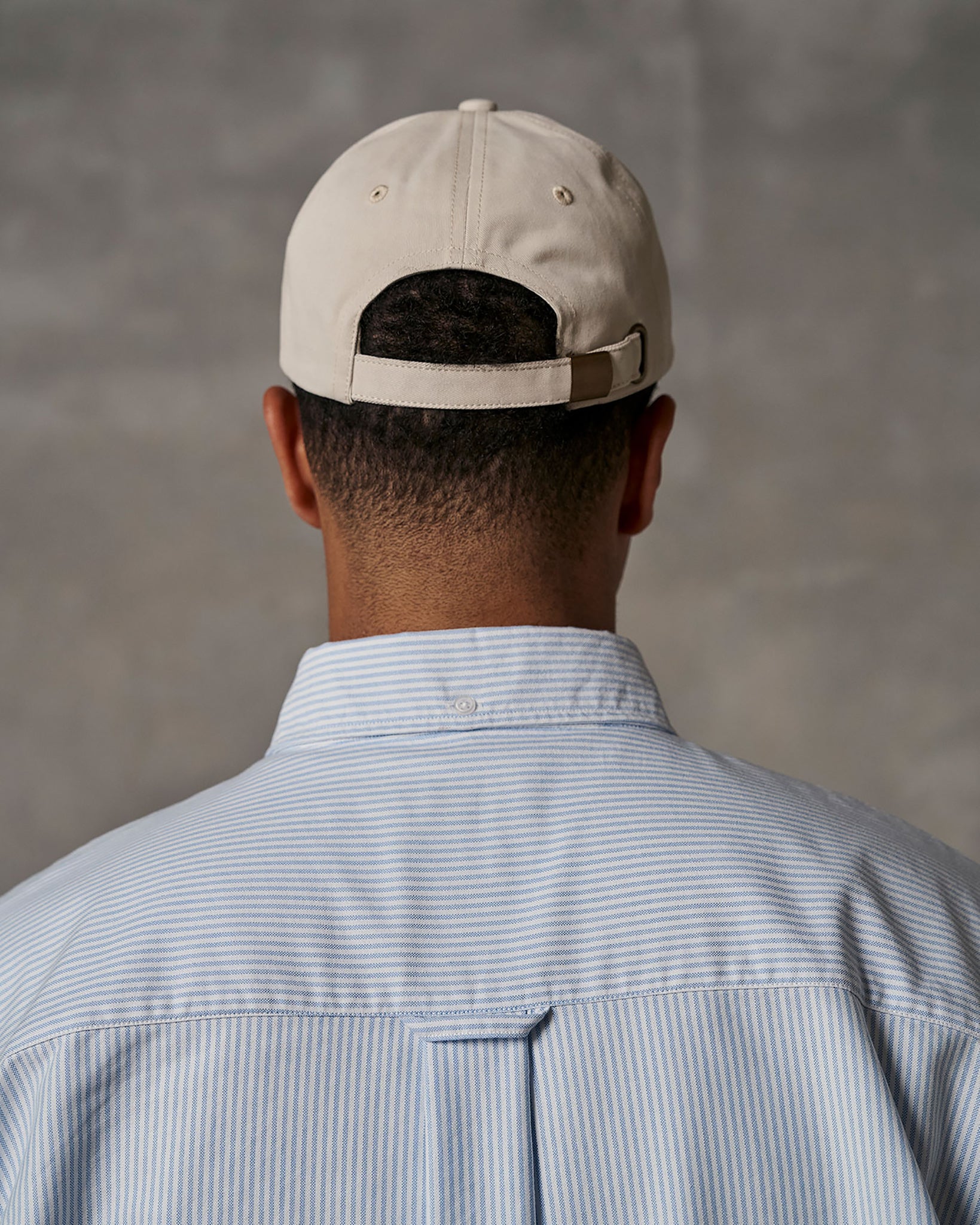 Locker loop detail on casual blue striped men's shirt